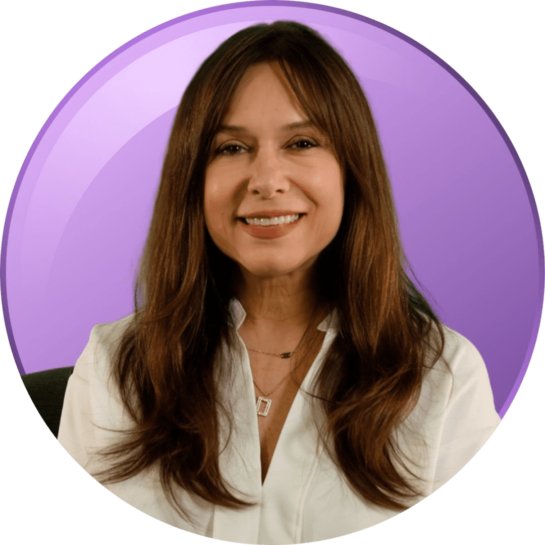 Professional woman smiling against a purple background.