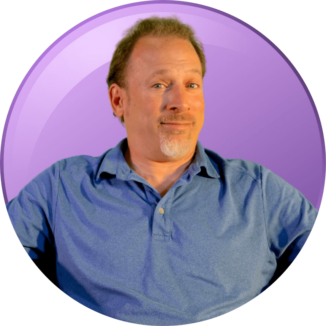 Middle-aged man in a blue polo shirt against a purple background.